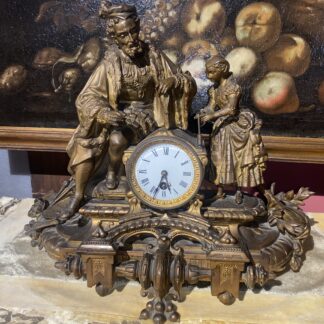 Orologio francese in antimonio dorato di Phillipe H. Mourey (1840-1910)