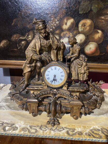 Orologio francese in antimonio dorato di Phillipe H. Mourey (1840-1910)